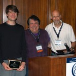 Dr. Nicolas Kervyn and Chris Malone Accept the Award
